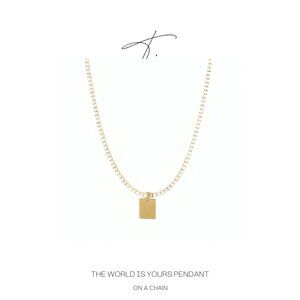 The World Is Yours Pendant on a Chain